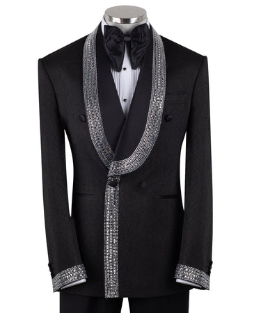 Black double-breasted tuxedo jacket with intricate silver hand-embellished shawl lapels, front detail, and cuffs, paired with black satin stripe trousers on a mannequin. From BTS Bespoke, handcrafted in Istanbul.