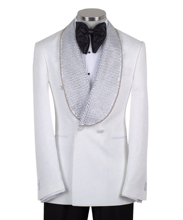 Full shot of a white double-breasted tuxedo with silver crystal-embellished shawl lapels and black trousers with satin stripes, displayed on a mannequin. Handcrafted luxury suit from BTS Bespoke.