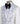 Front view of a white heavily embellished three-piece tuxedo with silver sequins and beadwork, featuring a shawl lapel and a matching white vest, displayed on a mannequin. Handmade in Istanbul.