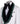 White double-breasted tuxedo jacket with textured fabric, black velvet shawl lapel, emerald green hand-embellished jewels, black buttons, and matching black trousers. Luxurious, handcrafted in Istanbul by BTS Bespoke.