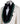 BTS Bespoke Cream textured double-breasted tuxedo with black velvet shawl lapel and emerald green hand-embellishments on jacket front, lapel, and cuffs, paired with black trousers.