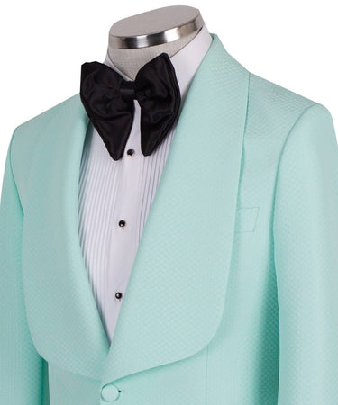 Aqua textured fabric shawl lapel tuxedo jacket on a mannequin, single-breasted, one-button closure. Showcase of BTS Bespoke's luxury handcrafted Istanbul tailoring.
