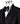 Front view of a black hand-embellished three-piece tuxedo by BTS Bespoke, featuring a single-breasted jacket with satin shawl lapels and a double-breasted vest, showcased on a mannequin.