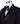BTS Bespoke black double-breasted tuxedo jacket with intricate hand-embellished crystal and bead detailing on lapels, shoulders, chest, sleeves, and back, displayed on a mannequin, front and back views, close-up of embellishments.