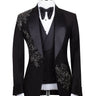 BTS Bespoke Black Embellished Three-Piece Tuxedo. Handcrafted single-breasted jacket with peak lapel and shimmering crystal embellishments. Includes matching double-breasted vest and trousers.