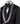 Black double-breasted tuxedo jacket with intricate silver hand-embellished shawl lapels, front detail, and cuffs, paired with black satin stripe trousers on a mannequin. From BTS Bespoke, handcrafted in Istanbul.