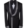 Black double-breasted tuxedo jacket with intricate silver hand-embellished shawl lapels, front detail, and cuffs, paired with black satin stripe trousers on a mannequin. From BTS Bespoke, handcrafted in Istanbul.