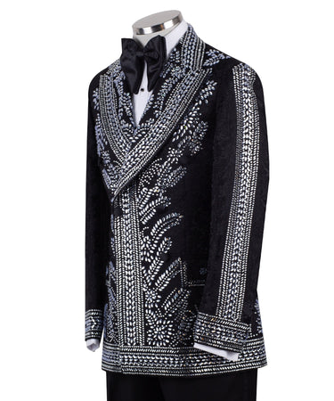 Front view of a black double-breasted tuxedo jacket with extensive silver embellishments, featuring a peak lapel and slim fit design on a mannequin. Back view and close-up showing intricate hand-beading detail.