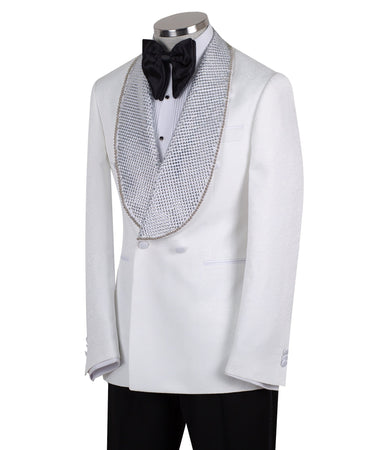 Full shot of a white double-breasted tuxedo with silver crystal-embellished shawl lapels and black trousers with satin stripes, displayed on a mannequin. Handcrafted luxury suit from BTS Bespoke.