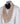 White double-breasted tuxedo jacket with golden hand-embellished shawl lapel and black tuxedo trousers, masterfully tailored in Istanbul by BTS Bespoke.