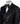 Black embellished jacquard double-breasted tuxedo with satin peak lapels and hand-beaded details on the shoulders and lapel, shown with matching plain black trousers with satin side stripe, handcrafted by BTS Bespoke in Istanbul.