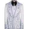 Front view of a white heavily embellished three-piece tuxedo with silver sequins and beadwork, featuring a shawl lapel and a matching white vest, displayed on a mannequin. Handmade in Istanbul.