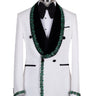White double-breasted tuxedo jacket with textured fabric, black velvet shawl lapel, emerald green hand-embellished jewels, black buttons, and matching black trousers. Luxurious, handcrafted in Istanbul by BTS Bespoke.
