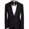 Black single-breasted tuxedo with subtle jacquard pattern and elegant shawl lapel, handcrafted in Istanbul by BTS Bespoke, front view on mannequin.