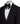 Black single-breasted tuxedo with subtle jacquard pattern and elegant shawl lapel, handcrafted in Istanbul by BTS Bespoke, front view on mannequin.